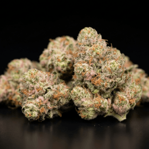 Pink Lemonade cannabis flower on a black background.