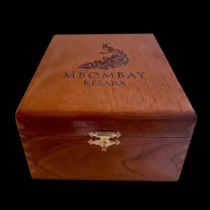 MBombay Kesara Wooden Stash Box on a black bg.